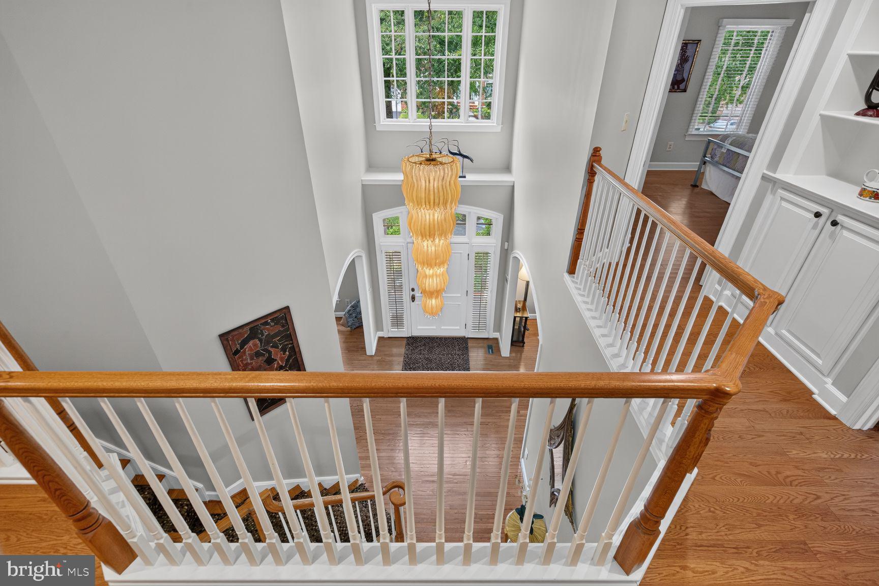 11081 Pelham Manor Place Reston, VA 20194 - Photo 37 of 99 Elegant foyer with stunning chandelier.