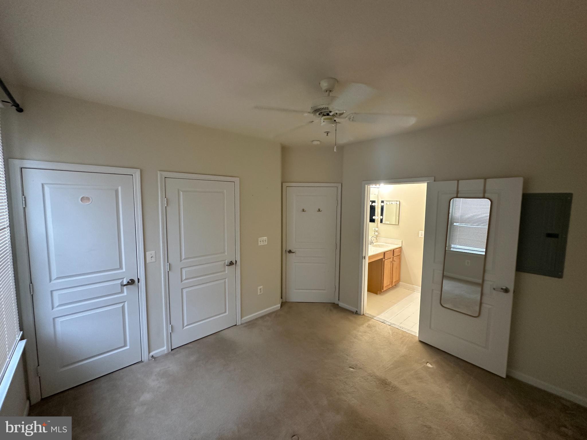 12001 Market Street, Unit 306 Reston, VA 20190 - Photo 12 of 13 Spacious room with multiple entryways.