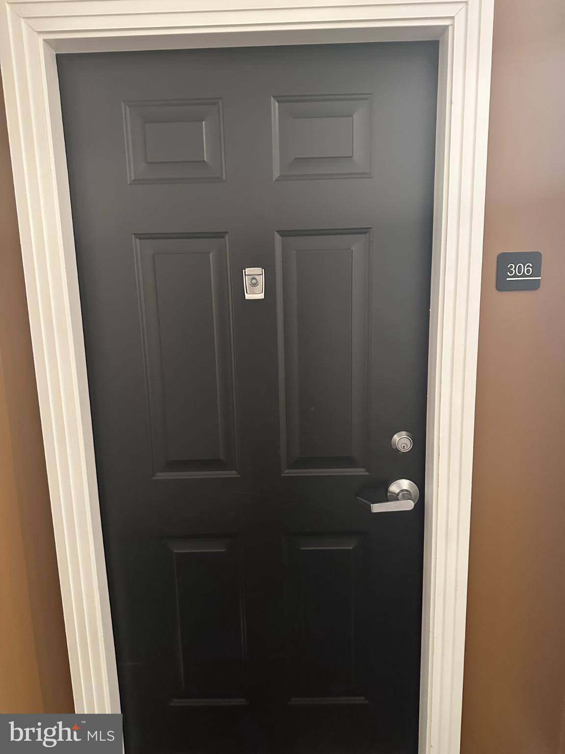12001 Market Street, Unit 306 Reston, VA 20190 - Photo 2 of 13 Inviting entrance to room 306 awaits you.
