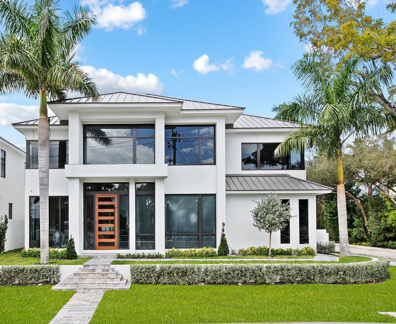 601 Cordova Road Fort Lauderdale, FL 33316 - Photo 1 of 5 a front view of a house with garden