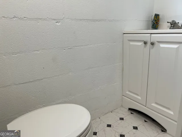 a room with chair and gym equipment