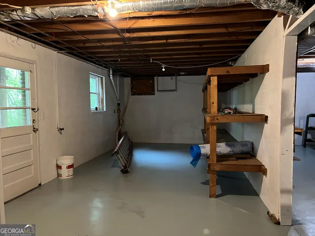 a view of room with gym equipment