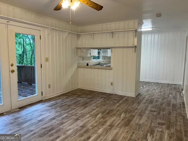 a bathroom with a bathtub and window