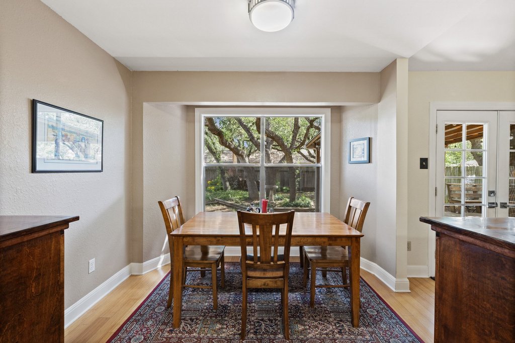 4526 Langtry Lane Austin, TX 78749 - Photo 8 of 33 Kitchen table looks out into backyard