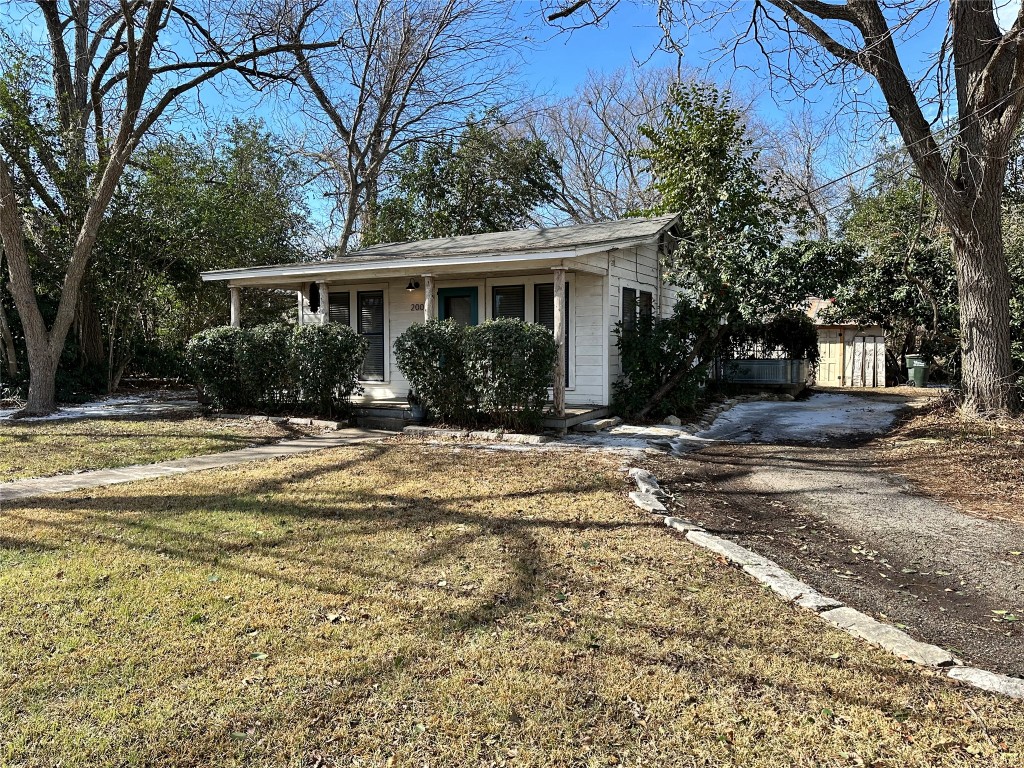 200 South Cedar Street Buda, TX 78610 - Photo 2 of 21 Circle driveway on the side of the home