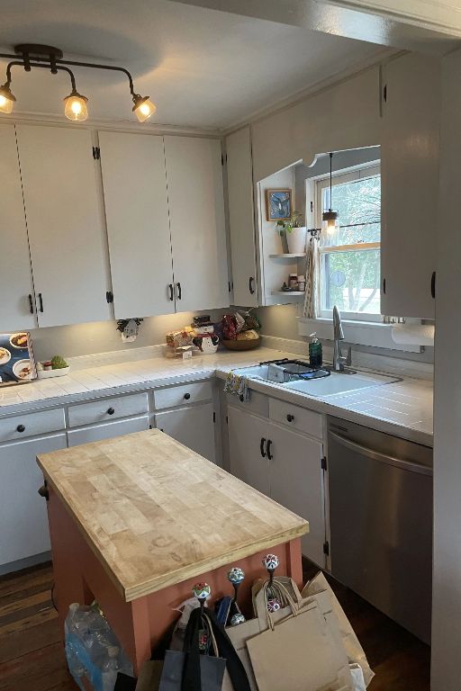 200 South Cedar Street Buda, TX 78610 - Photo 5 of 21 Kitchen includes stainless appliances and plenty of countertop space to cook your favorite dinner.