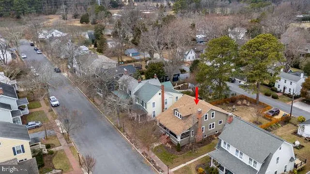 a view of a patio with table and chairs