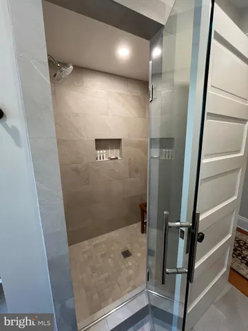 a view of a garden with a pathway