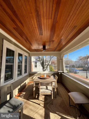 a bedroom with a bed and cupboard