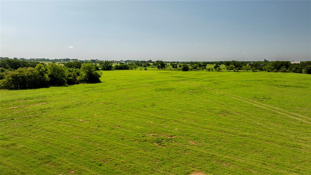 12520 Fm 455 E Pilot Point East Pilot Point, TX 76258 - Photo 28 of 37 a view of yard with ocean view