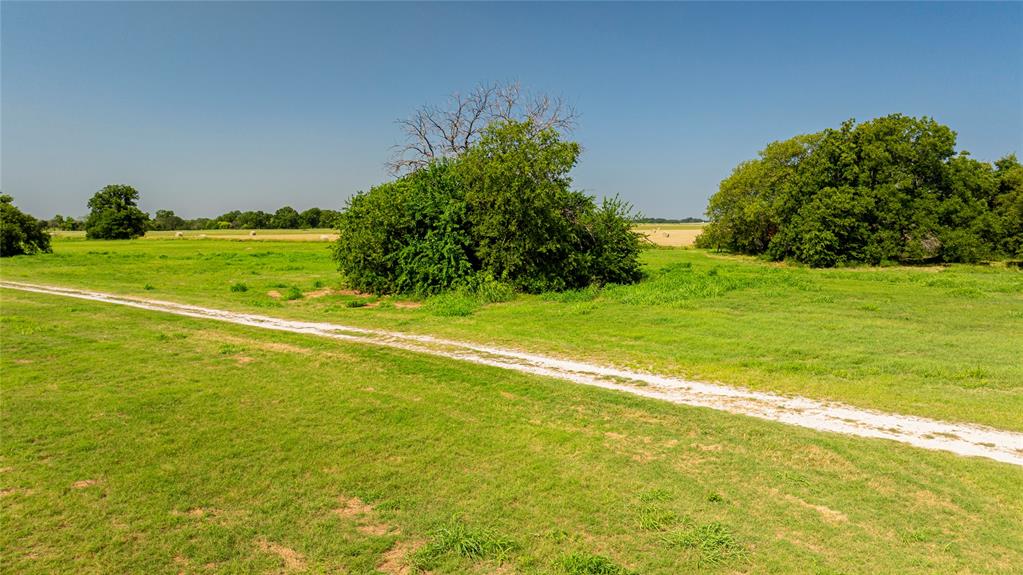 12520 Fm 455 E Pilot Point East Pilot Point, TX 76258 - Photo 8 of 37 a view of a garden and basketball court