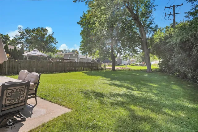 a view of a backyard with green space