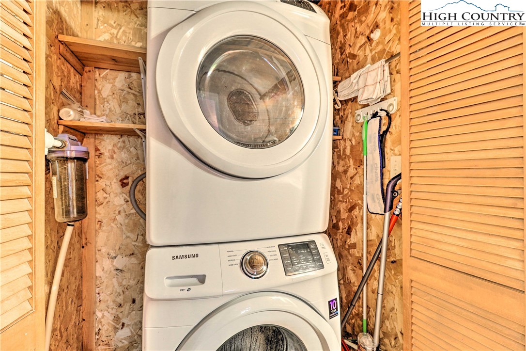 2280 Garvey Bridge Road Crumpler, NC 28617 - Photo 14 of 40 a utility room with dryer and washer
