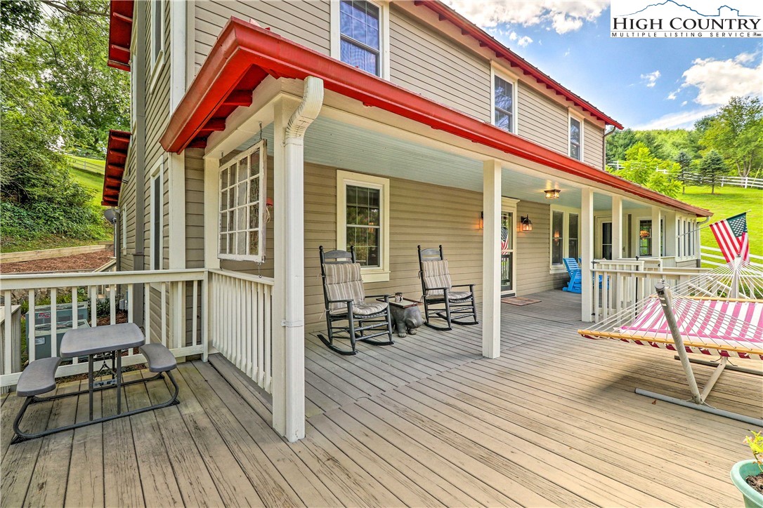 2280 Garvey Bridge Road Crumpler, NC 28617 - Photo 2 of 40 a front view of a house with sitting area
