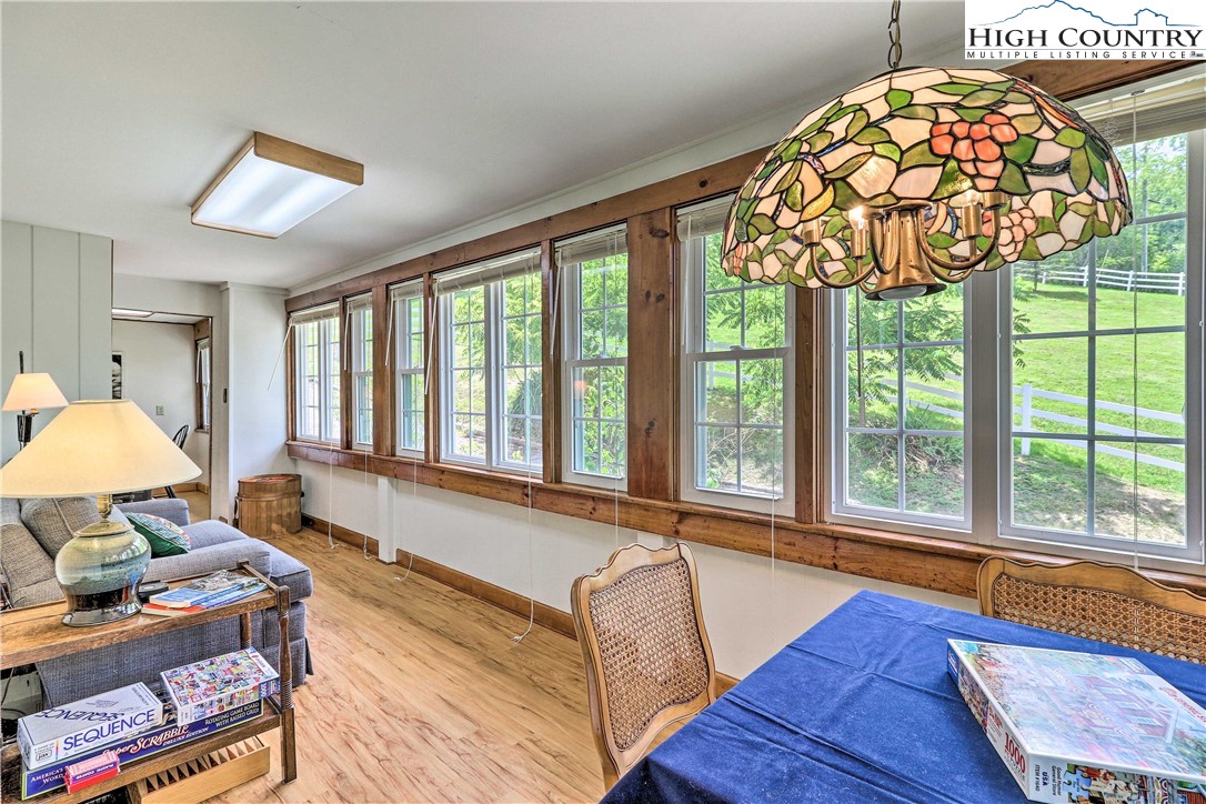 2280 Garvey Bridge Road Crumpler, NC 28617 - Photo 21 of 40 a living room with furniture and a window