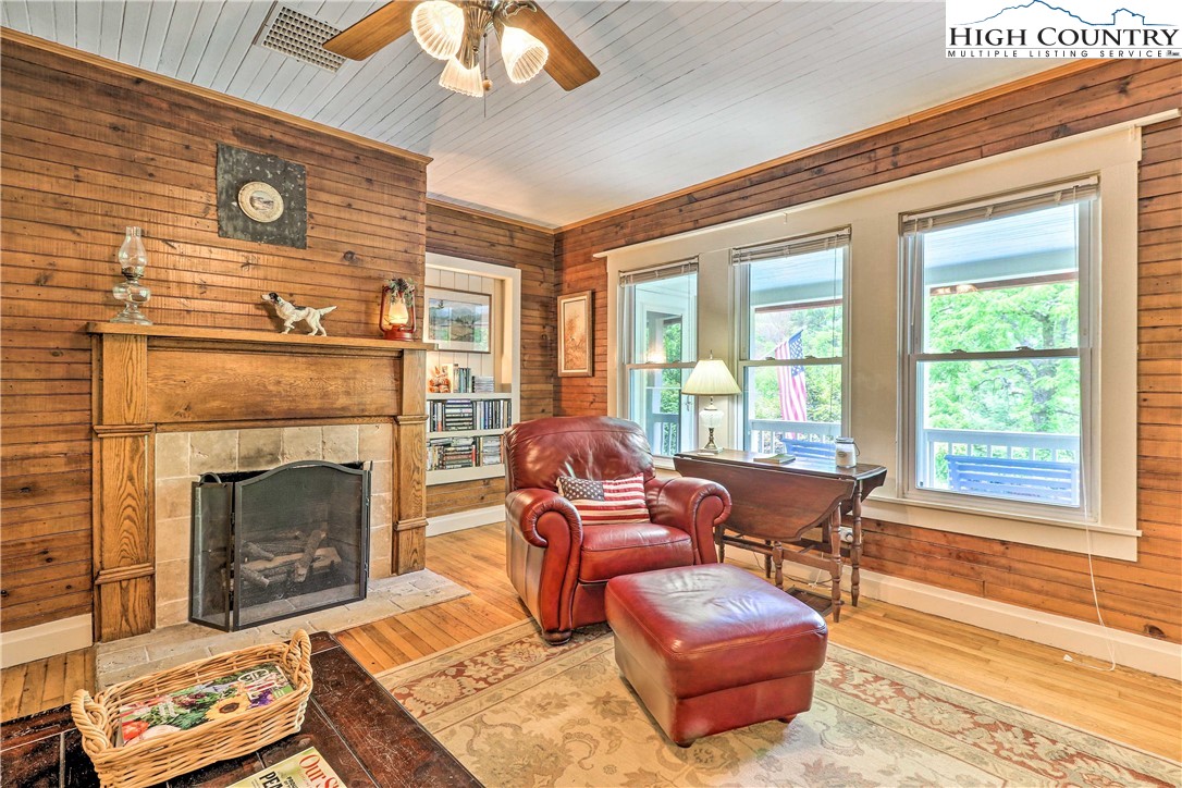 2280 Garvey Bridge Road Crumpler, NC 28617 - Photo 3 of 40 a living room with furniture and a fireplace