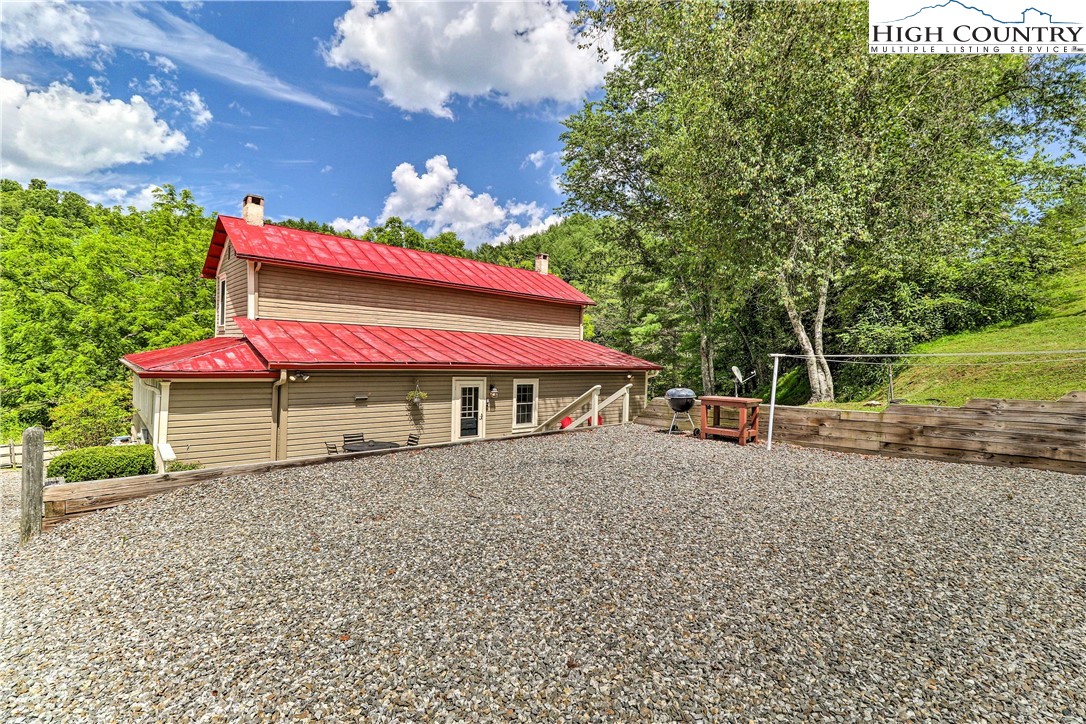 2280 Garvey Bridge Road Crumpler, NC 28617 - Photo 37 of 40 a house with sign broad in front of it