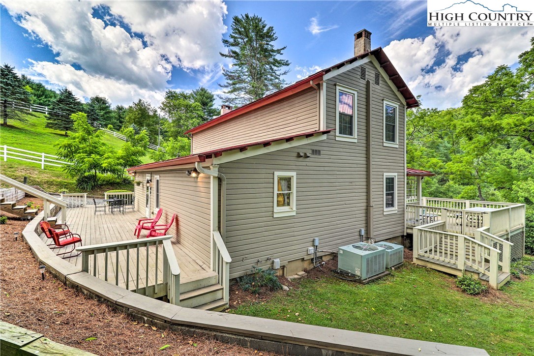 2280 Garvey Bridge Road Crumpler, NC 28617 - Photo 38 of 40 a front view of a house with porch