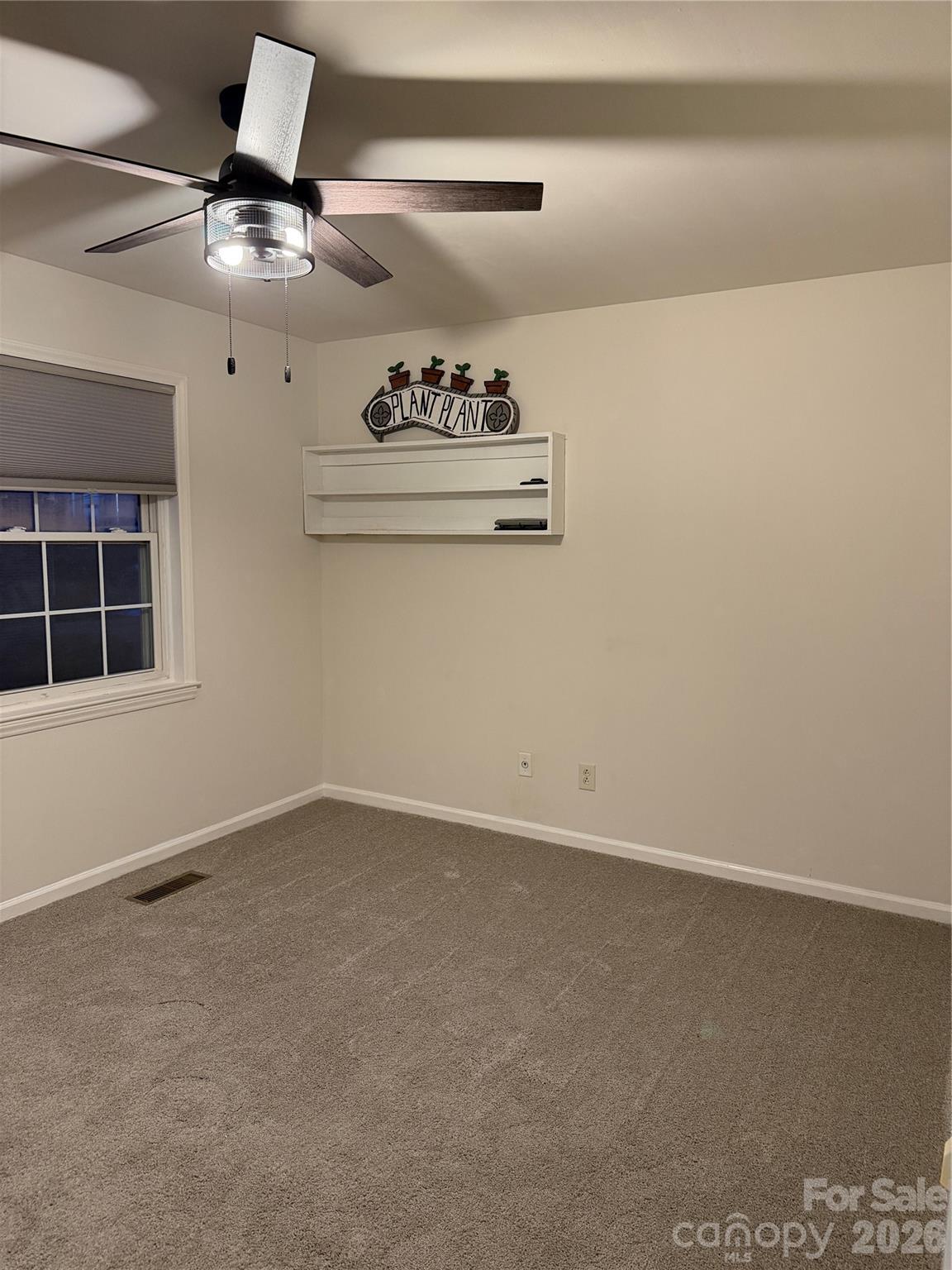 250 Nixon Road, Unit 19 Belmont, NC 28012 - Photo 12 of 27 a view of wooden floor and chandelier fan