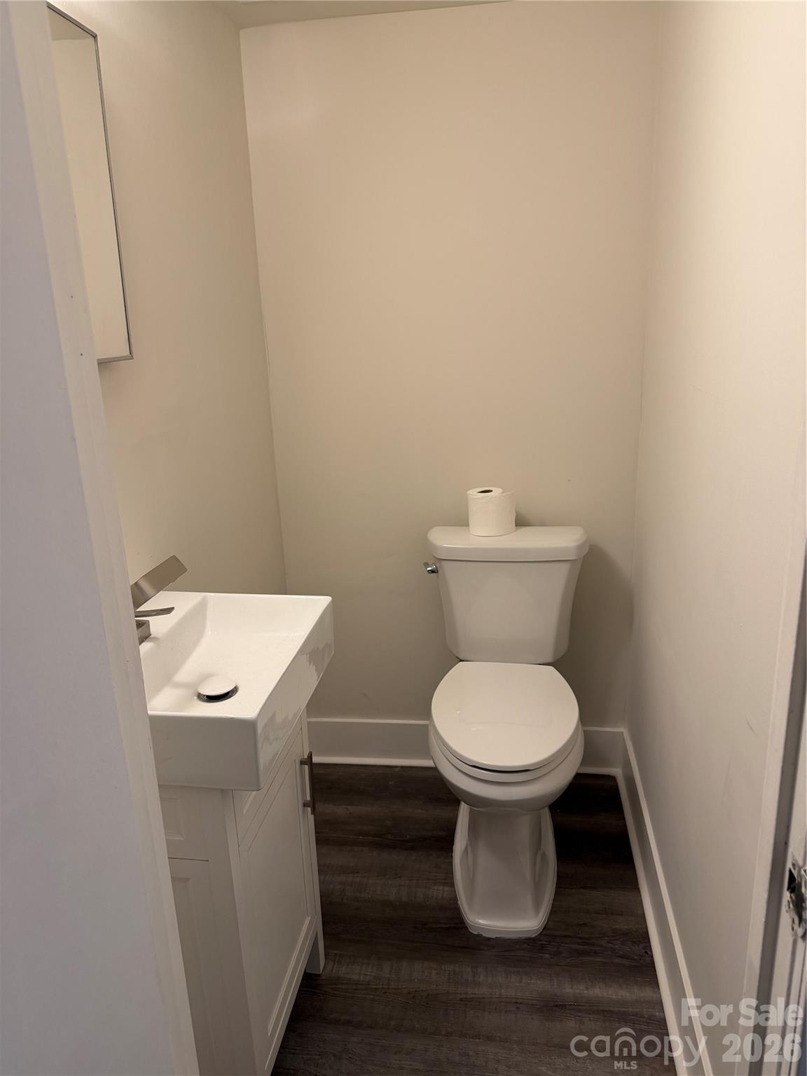 250 Nixon Road, Unit 19 Belmont, NC 28012 - Photo 25 of 27 a white toilet sitting next to a white sink