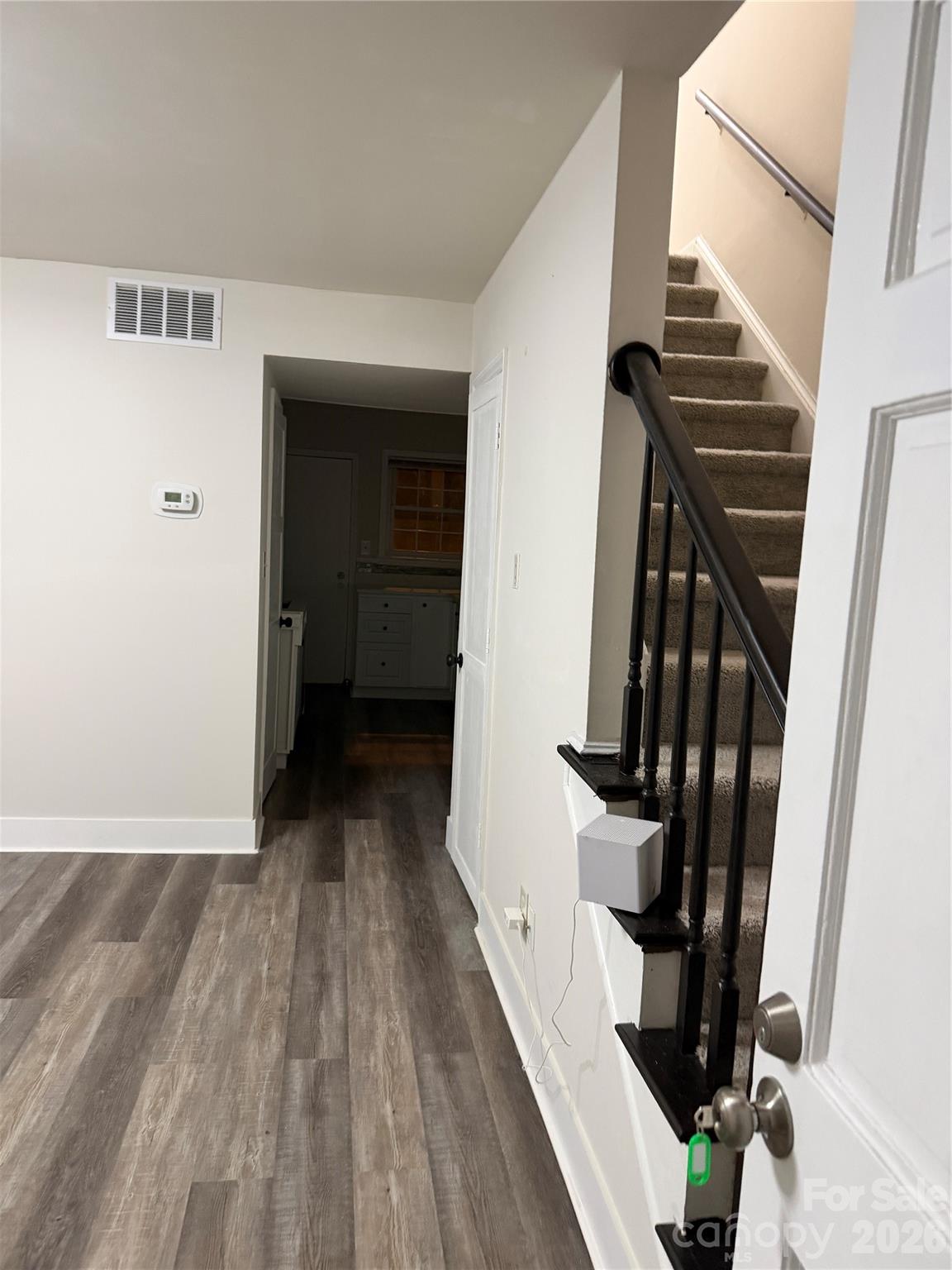 250 Nixon Road, Unit 19 Belmont, NC 28012 - Photo 4 of 27 a view of entryway with wooden floor