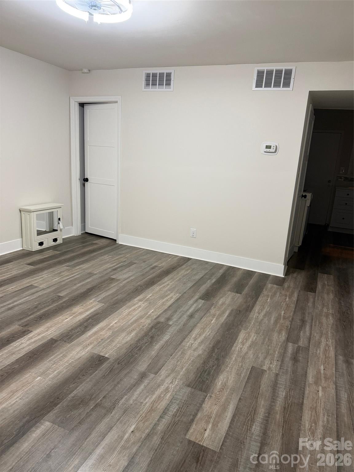 250 Nixon Road, Unit 19 Belmont, NC 28012 - Photo 5 of 27 a view of a livingroom with wooden floor