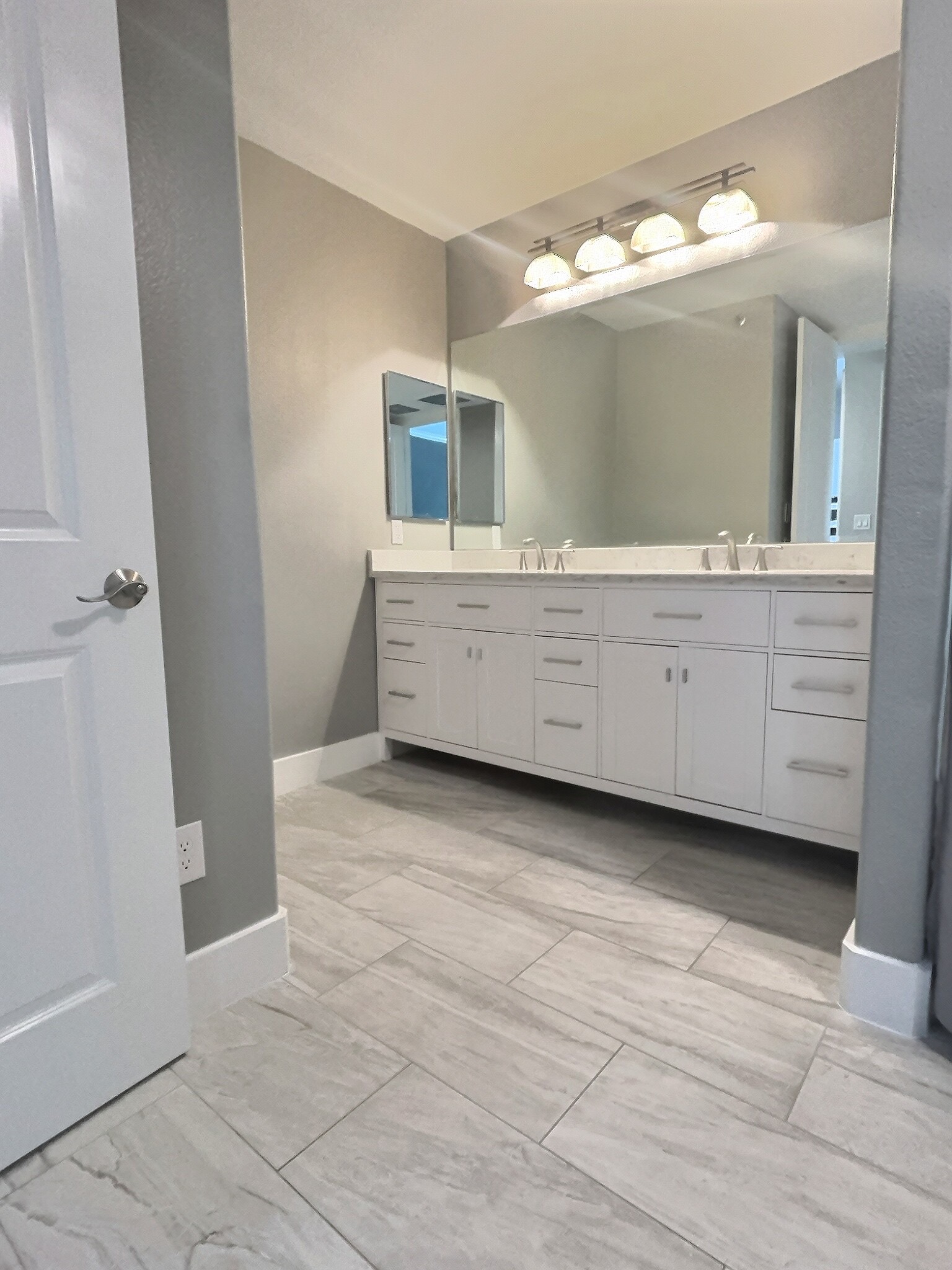 2216 Thornton Road, Unit 421 Austin, TX 78704 - Photo 26 of 31 Full bathroom with double vanity, quartz counters, upgraded tile, and plenty of storage.