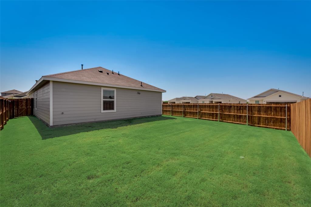 6112 Determine Lane Forney, TX 75126 - Photo 15 of 17 View of fenced backyard