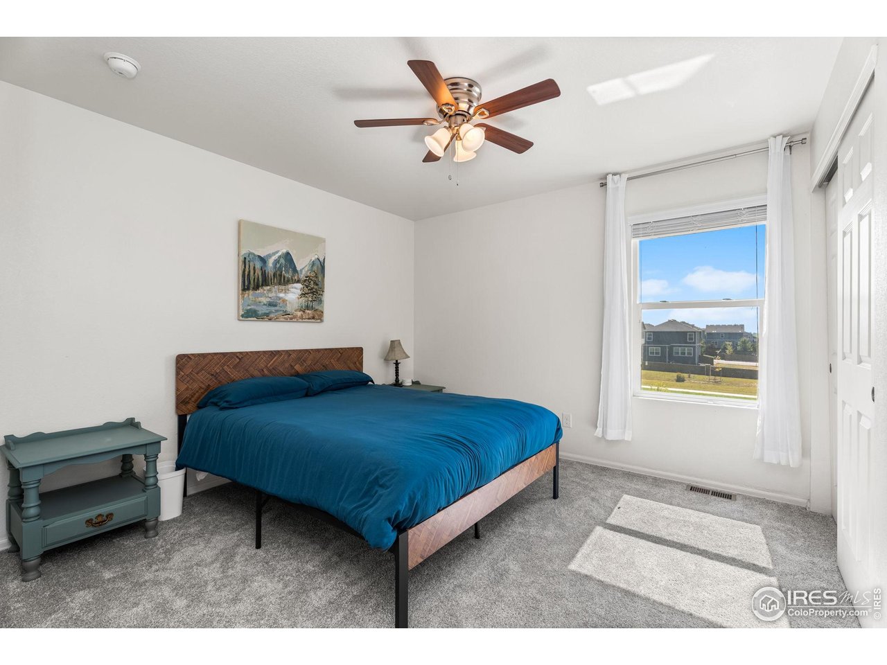 503 Buckrake Street Severance, CO 80550 - Photo 30 of 40 a bedroom with a bed and a window
