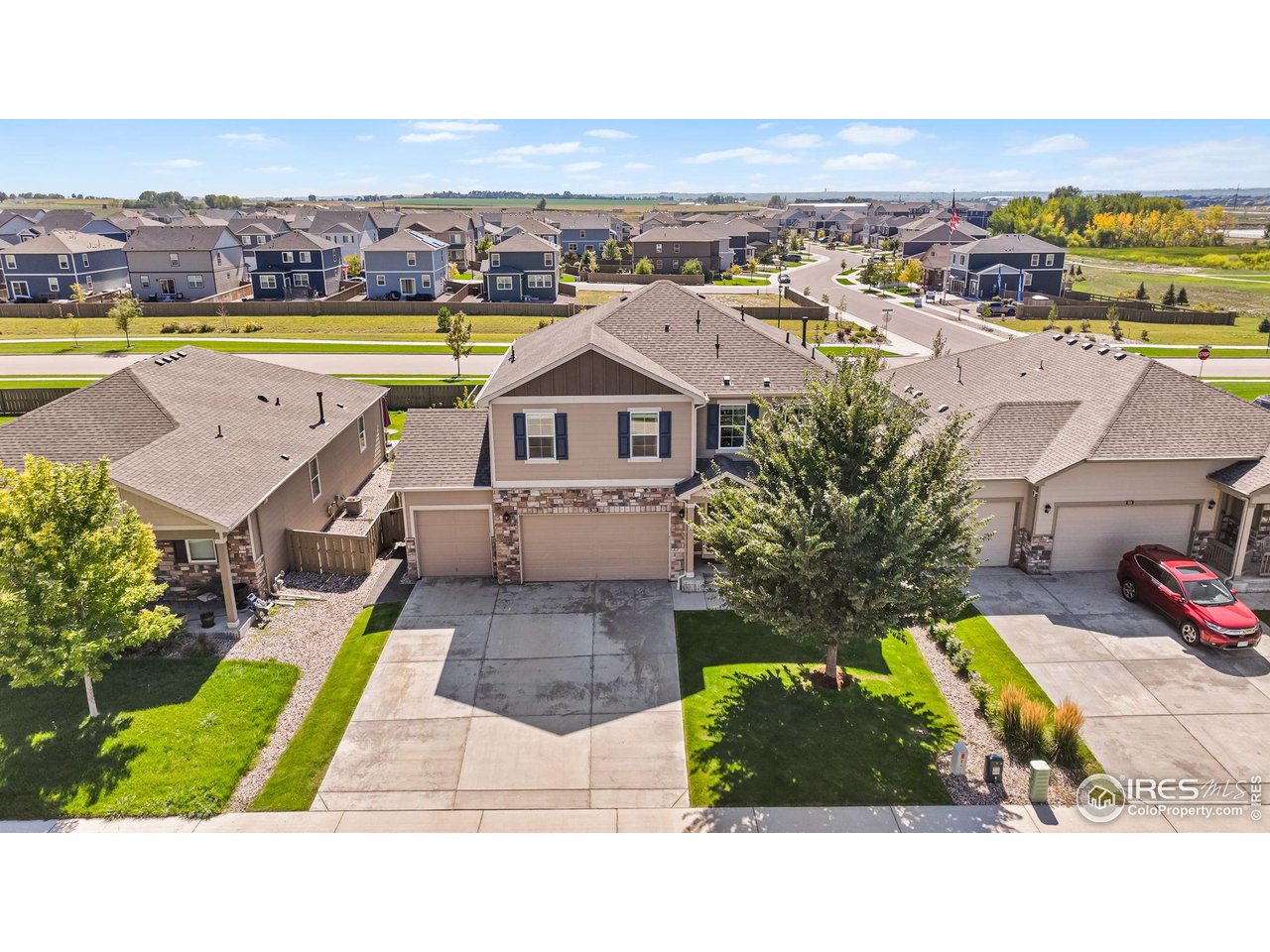 503 Buckrake Street Severance, CO 80550 - Photo 7 of 40 an aerial view of a house with a swimming pool yard and outdoor seating
