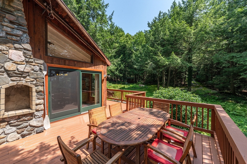 32 Pond Hill Road Goshen, MA 01096 - Photo 15 of 24 a view of backyard with outdoor seating and plants