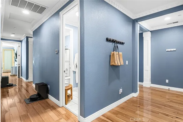 a white bath tub sitting next to a toilet