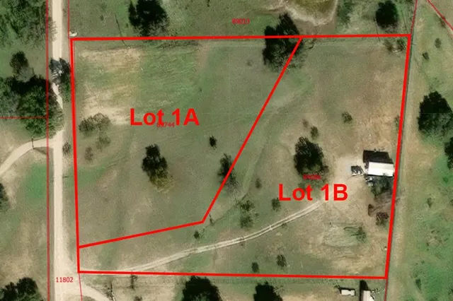 a view of a yard with an ocean