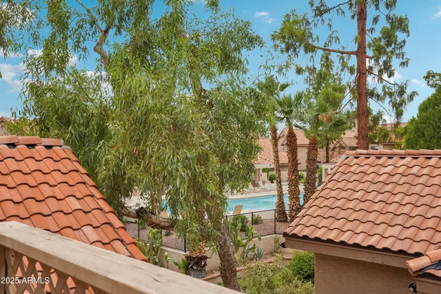 wooden floor fireplace and natural light in room