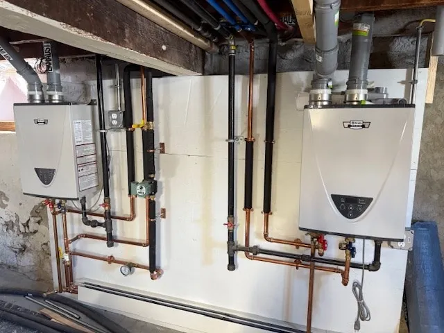 a view of a white house with a yard