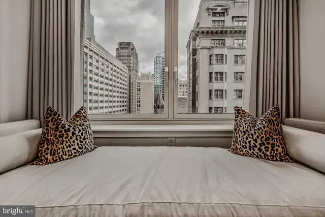 a bathroom with a bathtub and window