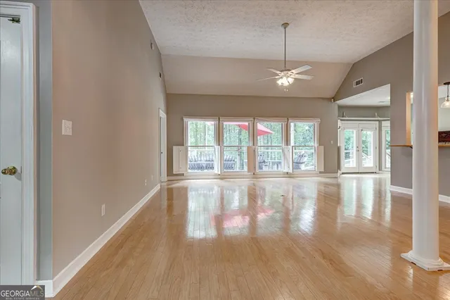 a view of a livingroom with wooden floor