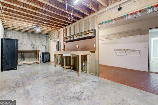 an aerial view of a house with a lake view