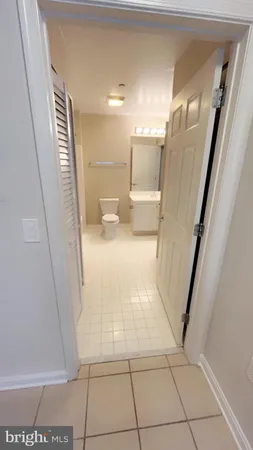 a bathroom with a sink a mirror and a shower