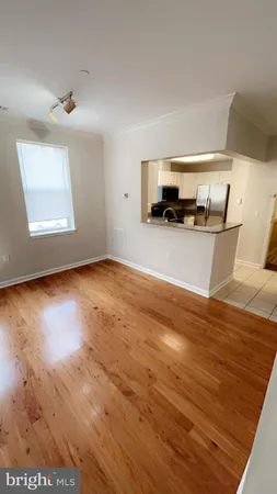 a view of a livingroom with furniture and wooden floor