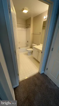 a view of bathroom and bathtub