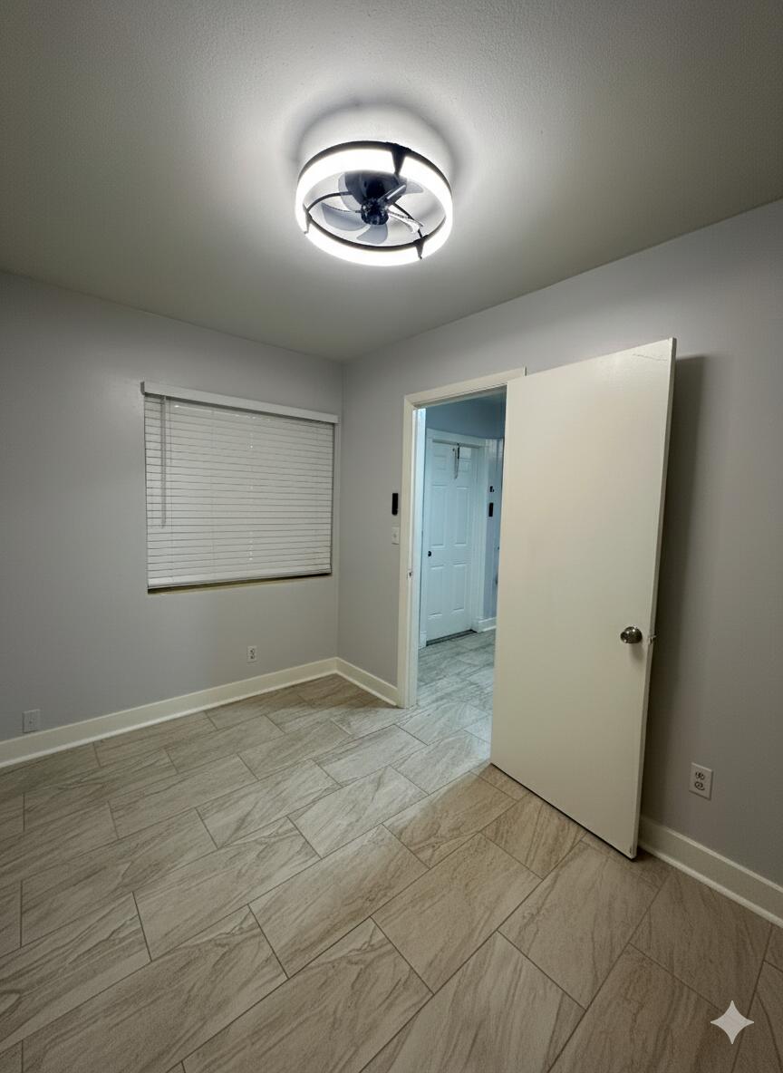 178 East 27th Street, Unit 3 Riviera Beach, FL 33404 - Photo 3 of 8 a view of an empty room