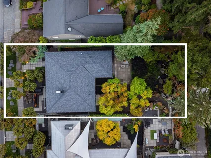 an aerial view of house with a swimming pool