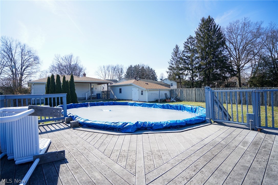 453 Omar Street Struthers, OH 44471 - Photo 7 of 27 View of pool with a wooden deck