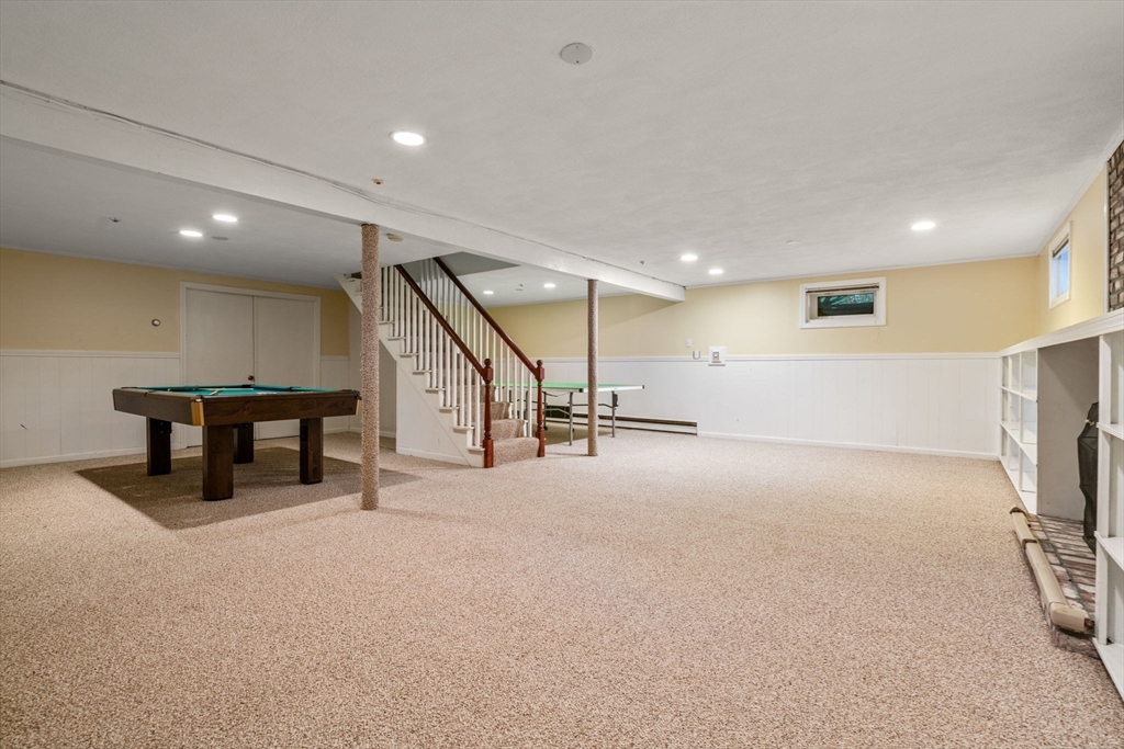 21 Pawnee Circle Milton, MA 02186 - Photo 13 of 17 a big room with table and chairs
