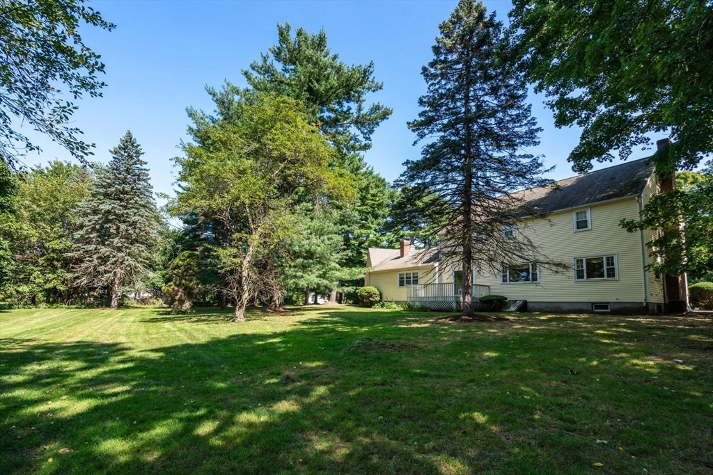 21 Pawnee Circle Milton, MA 02186 - Photo 2 of 17 a view of house with backyard