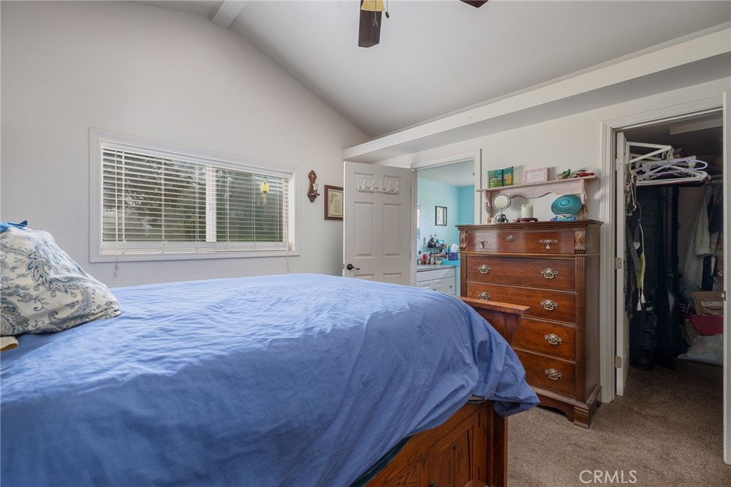 5072 Tip Top Road Mariposa, CA 95338 - Photo 12 of 41 a bedroom with a bed and a dresser