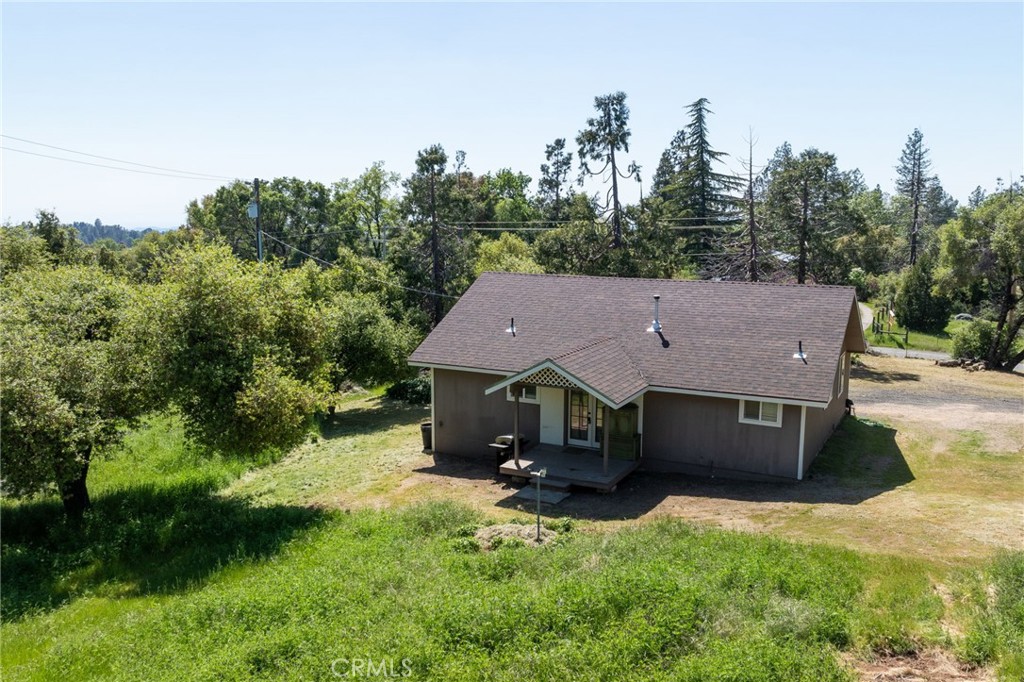 5072 Tip Top Road Mariposa, CA 95338 - Photo 20 of 41 a aerial view of a house with a yard table and chairs