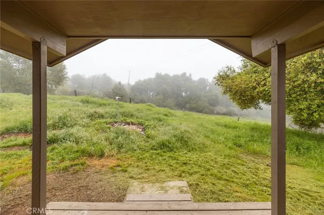 a view of a room with a large window
