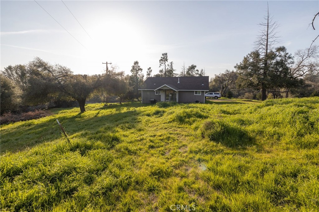 5072 Tip Top Road Mariposa, CA 95338 - Photo 27 of 41 a swimming pool with trees in the background
